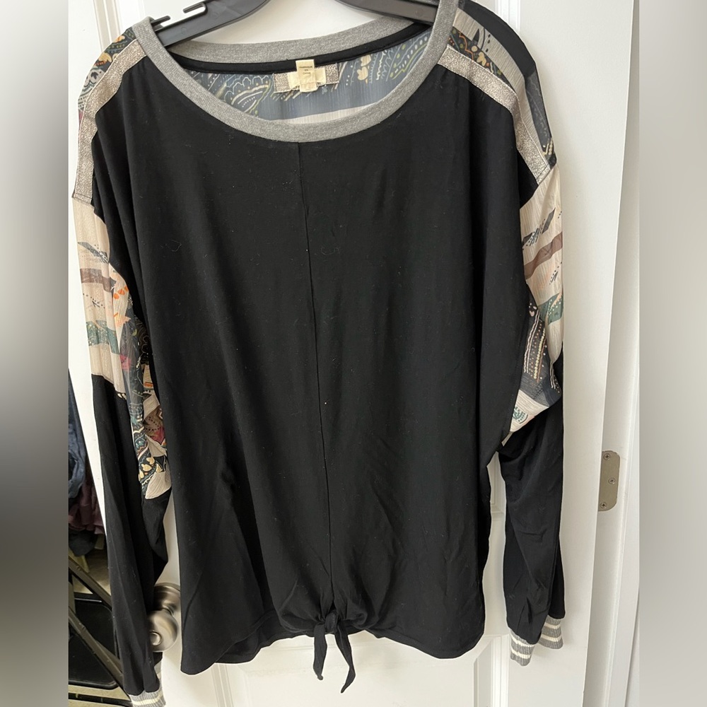 Anthropologie top with partially print shear sleeves and back